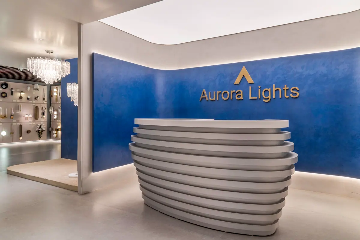 A lighting specification discussion with finish and material samples